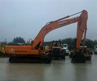 raining-on-equipment Equipment in the rain.